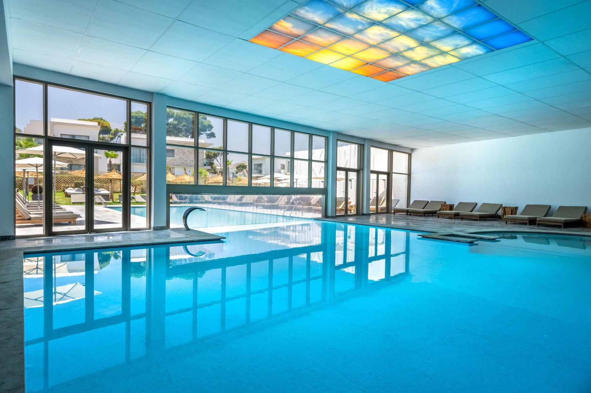 Radisson Blu Resort Al Hoceïma Eksteriør bilde The swimming pool at the hotel